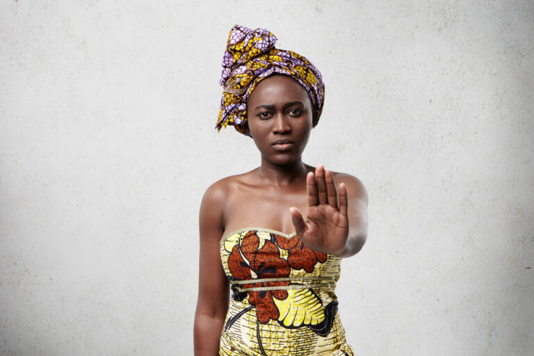 stop-it-african-woman-with-dark-smooth-skin-wearing-traditional-clothes-showing-her-palm-denying-something-confident-dark-skinned-female-showing-no-gesture-veto-demand-concept